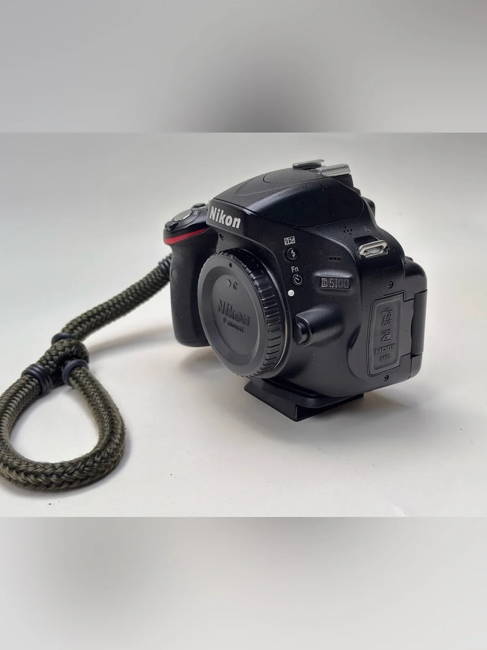 Nikon Black DSLR Camera Body with Black Lenses and Accessories